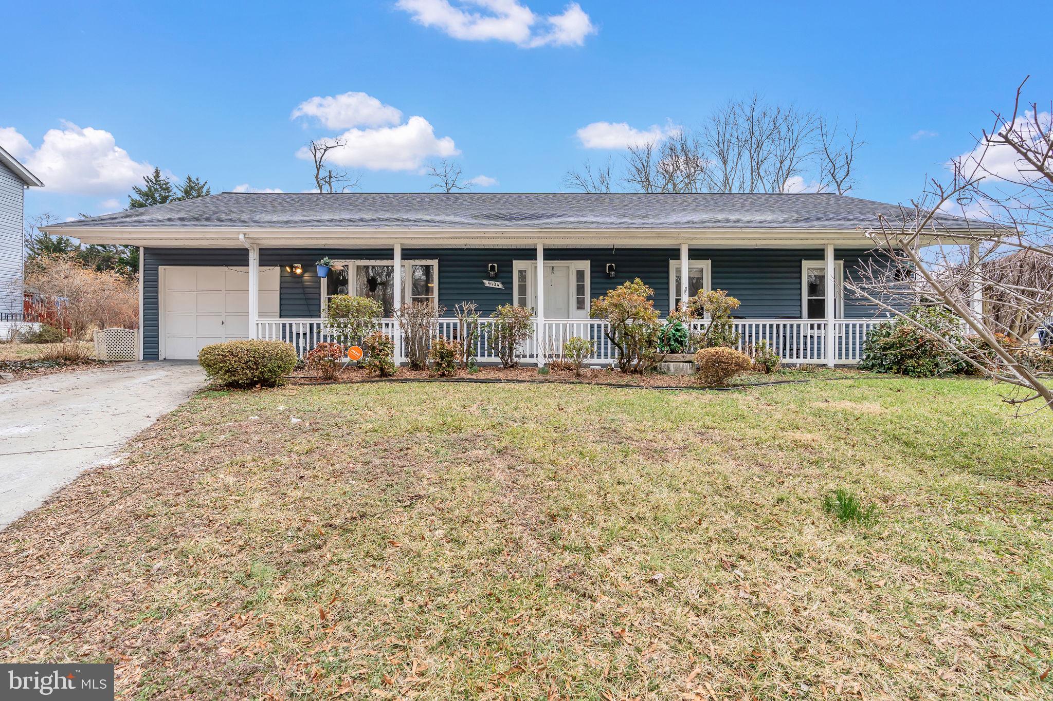 a front view of a house with patio outdoor seating