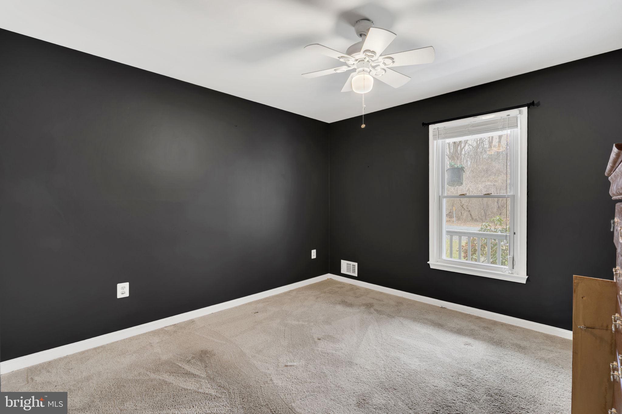 9104 Trumps Hill Road Upper Marlboro, MD 20772 - Photo 17 of 25 a view of a big room with windows