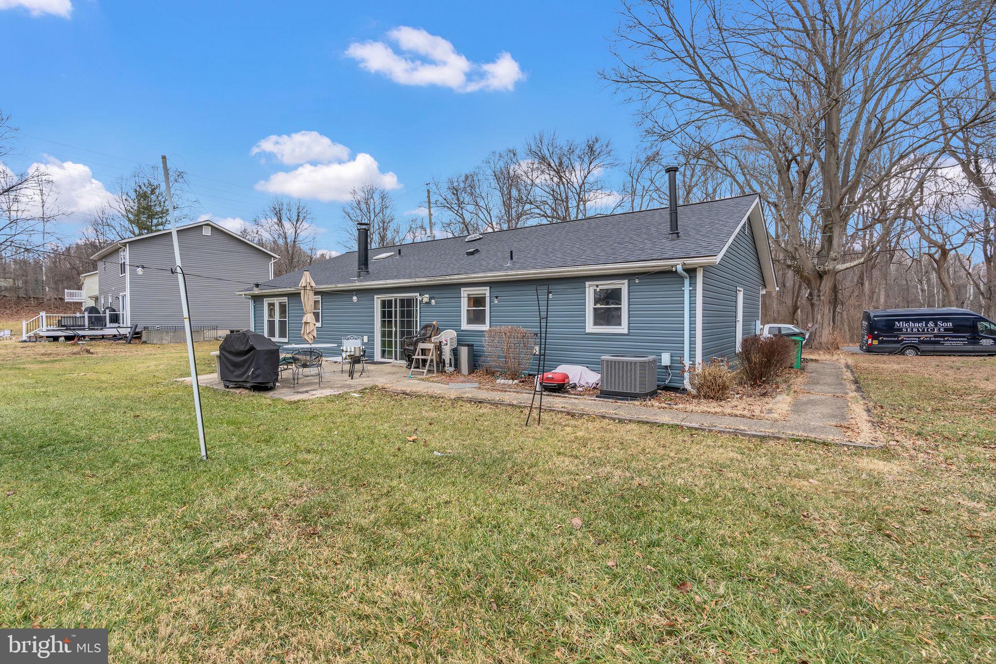 9104 Trumps Hill Road Upper Marlboro, MD 20772 - Photo 23 of 25 a front view of a house with garden