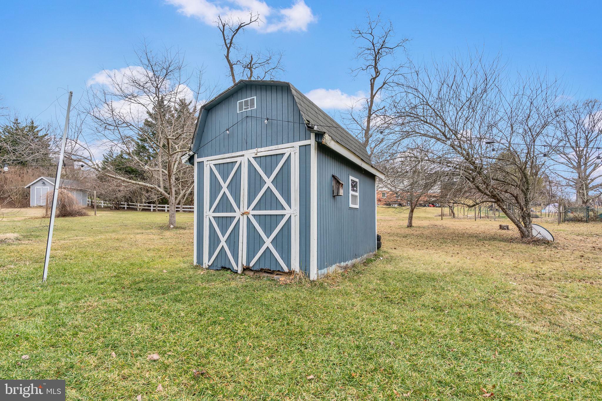 9104 Trumps Hill Road Upper Marlboro, MD 20772 - Photo 24 of 25 a front view of a house with garden