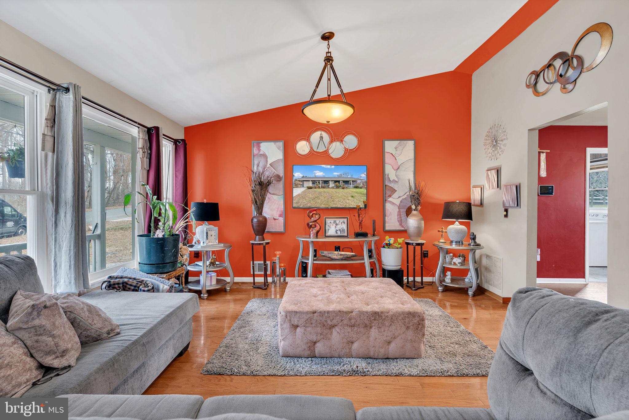 9104 Trumps Hill Road Upper Marlboro, MD 20772 - Photo 3 of 25 a living room with furniture and large windows