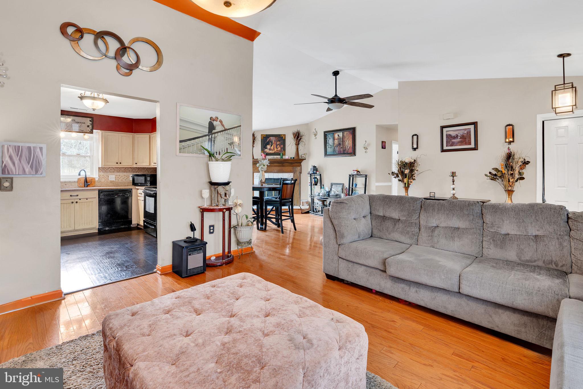 9104 Trumps Hill Road Upper Marlboro, MD 20772 - Photo 5 of 25 a living room with furniture and wooden floor