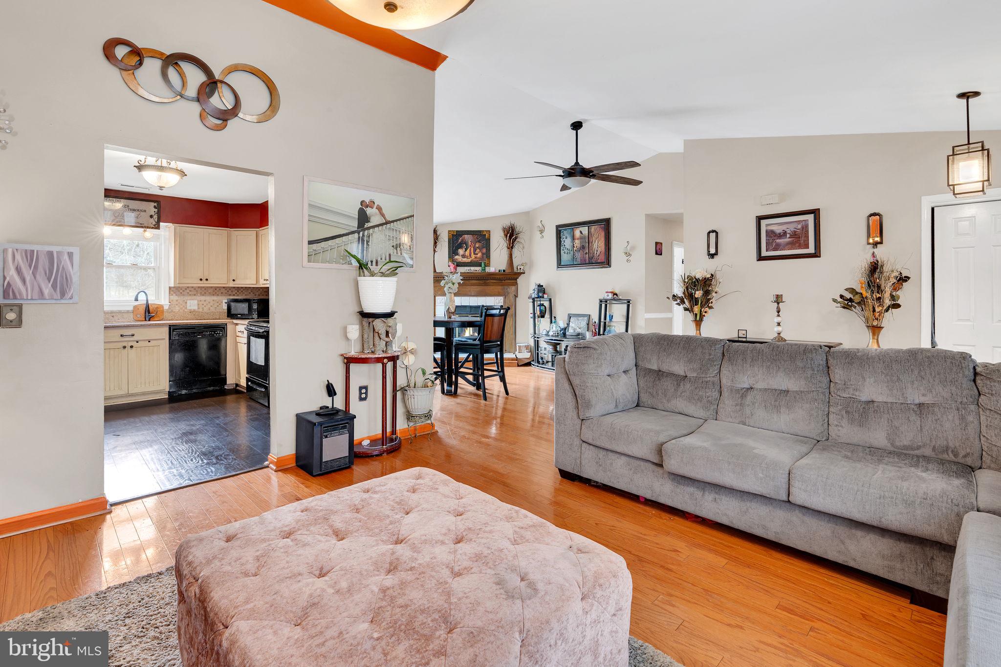 9104 Trumps Hill Road Upper Marlboro, MD 20772 - Photo 7 of 25 a living room with furniture and wooden floor