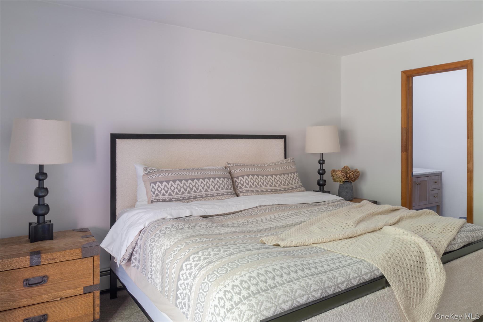 15 Deer Meadow Road Bethel, NY 12786 - Photo 22 of 40 a bedroom with a bed and a night stand
