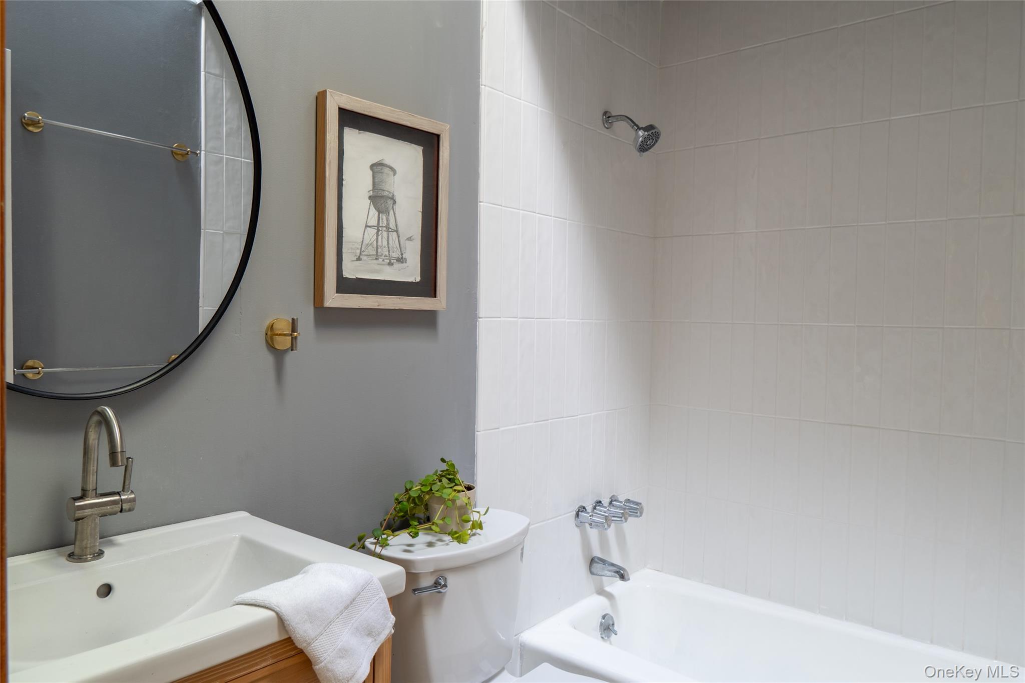 15 Deer Meadow Road Bethel, NY 12786 - Photo 25 of 40 a bathroom with a sink mirror and toilet
