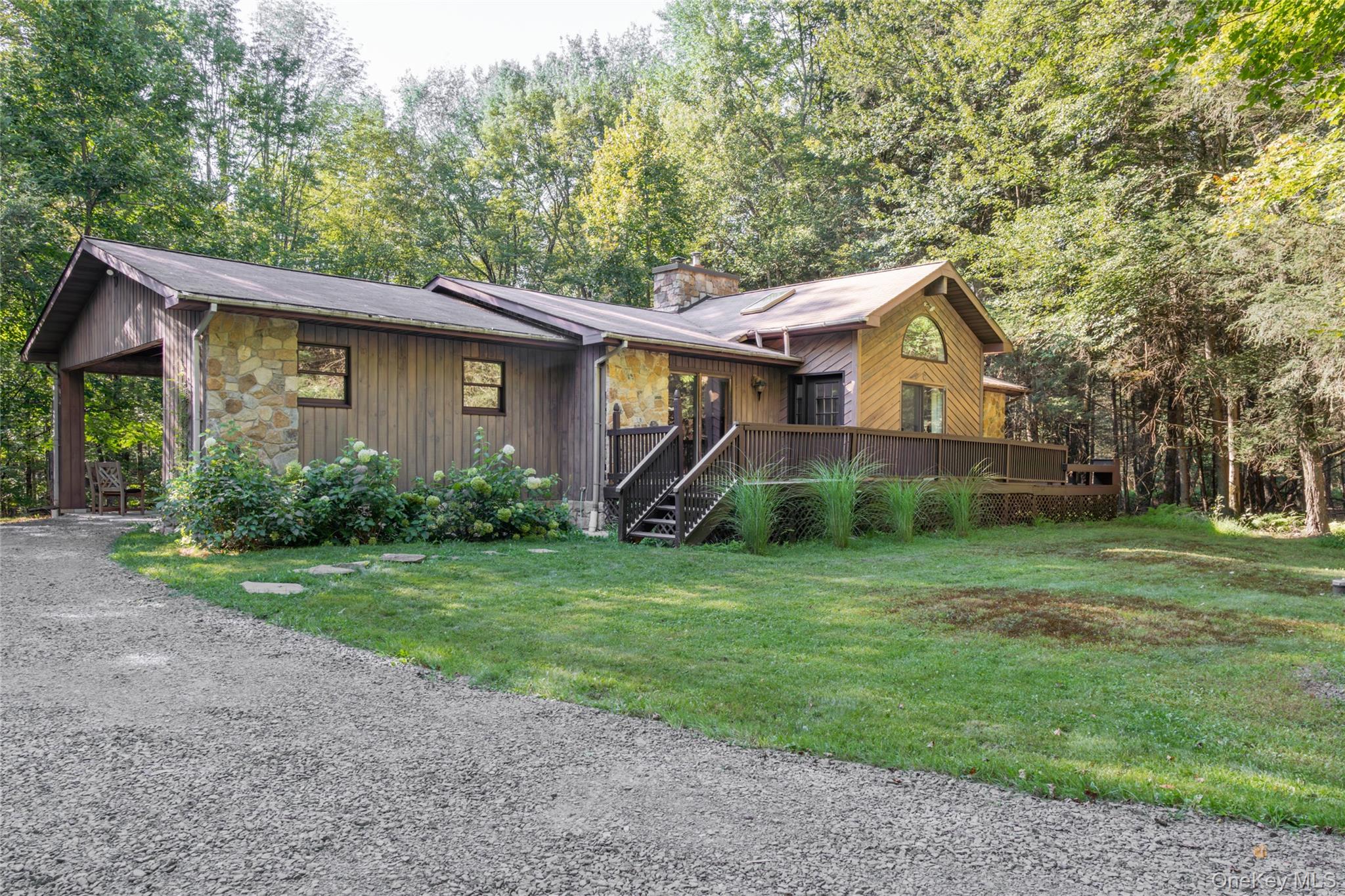 15 Deer Meadow Road Bethel, NY 12786 - Photo 29 of 40 a front view of a house with garden