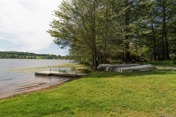 a view of a house with a tree