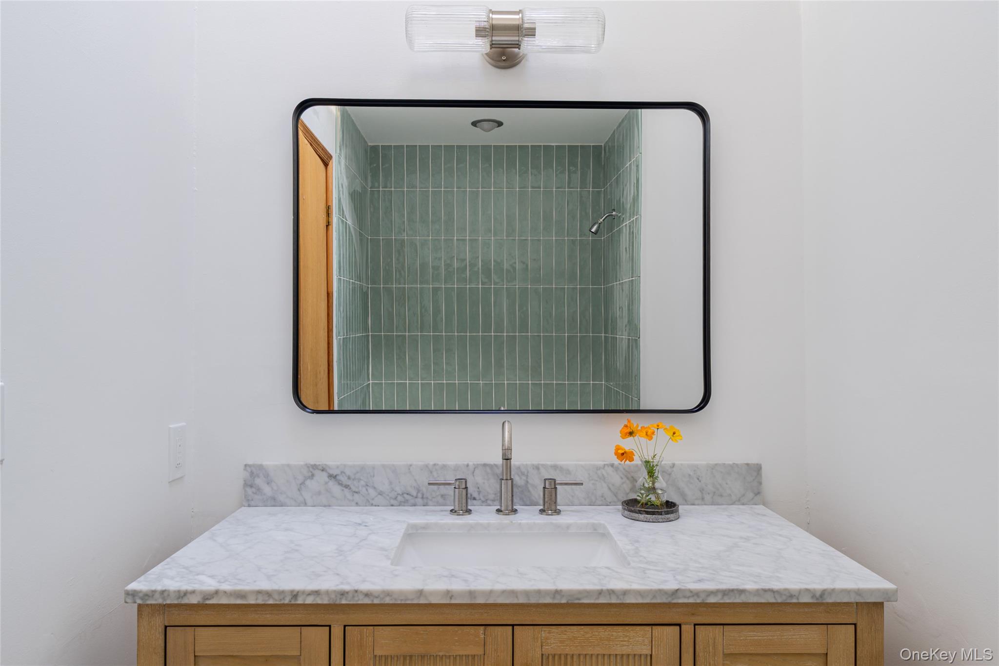 15 Deer Meadow Road Bethel, NY 12786 - Photo 7 of 40 a bathroom with a sink and a mirror