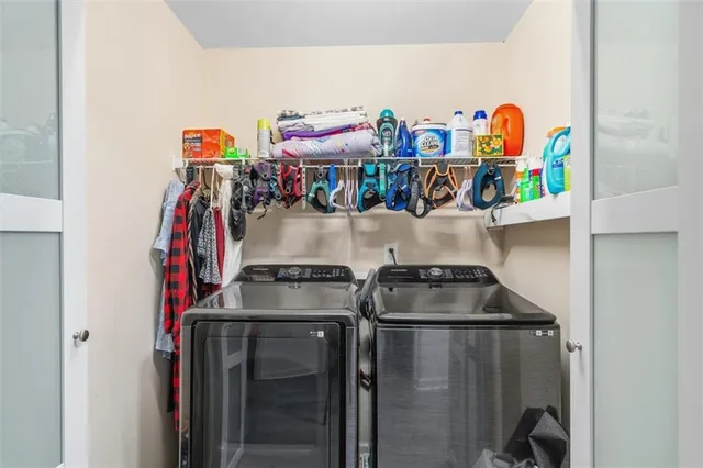 a utility room with dryer and washer