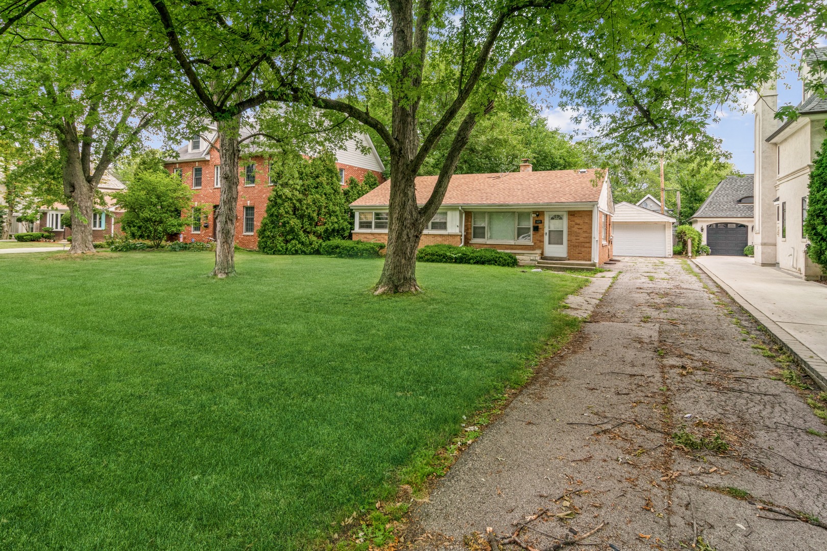 front view of a house with a yard