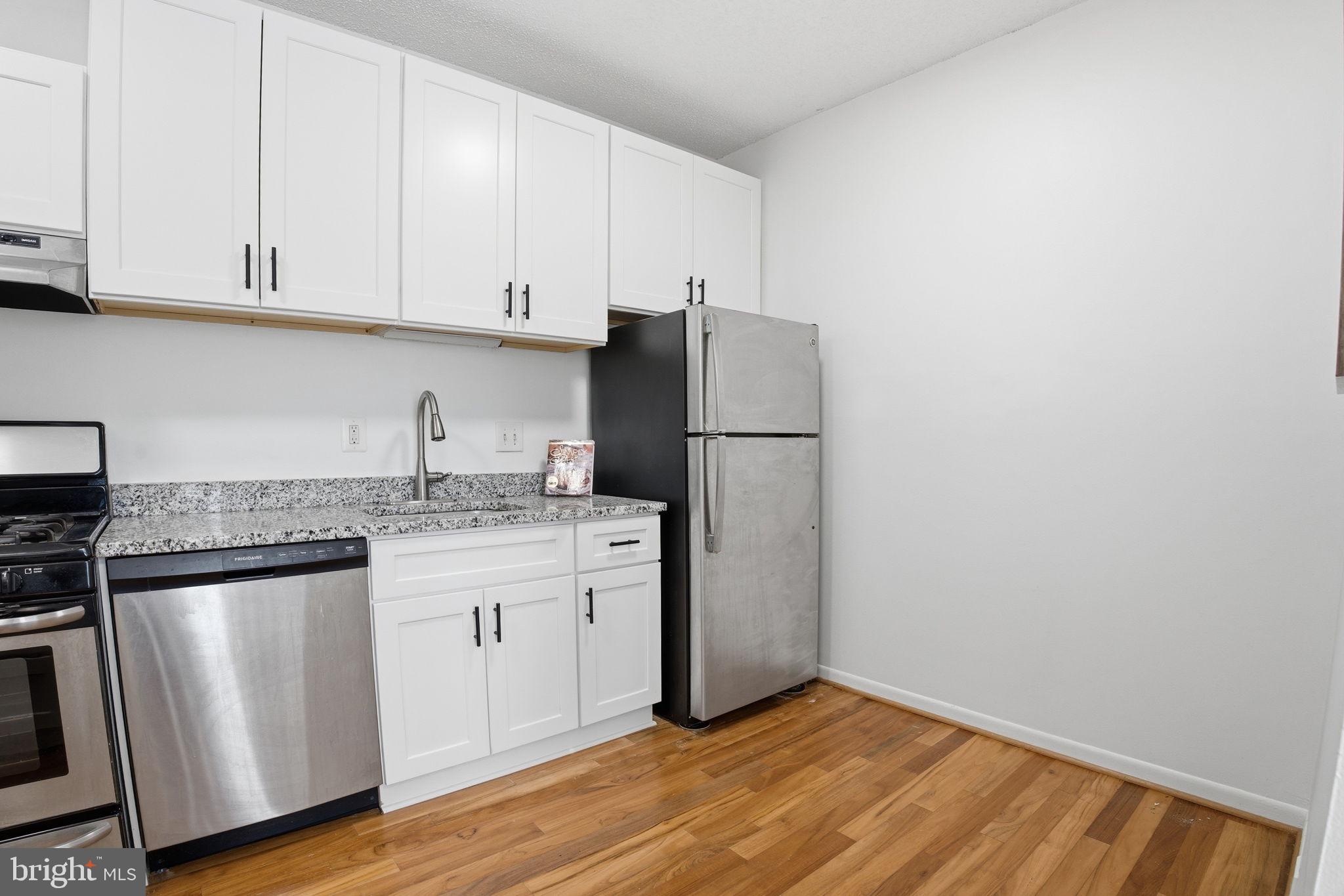 11805 Breton Court, Unit 1A Reston, VA 20191 - Photo 15 of 25 Kitchen with Appliances