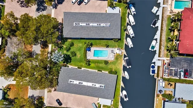 a view of a swimming pool with a garden