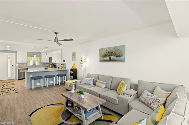 a living room with furniture and a table