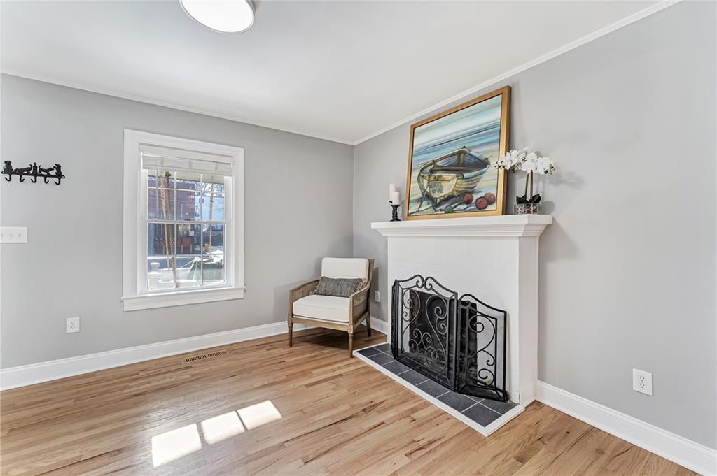 777 Forrest Street Northwest Atlanta, GA 30318 - Photo 11 of 35 a living room with furniture and a fireplace