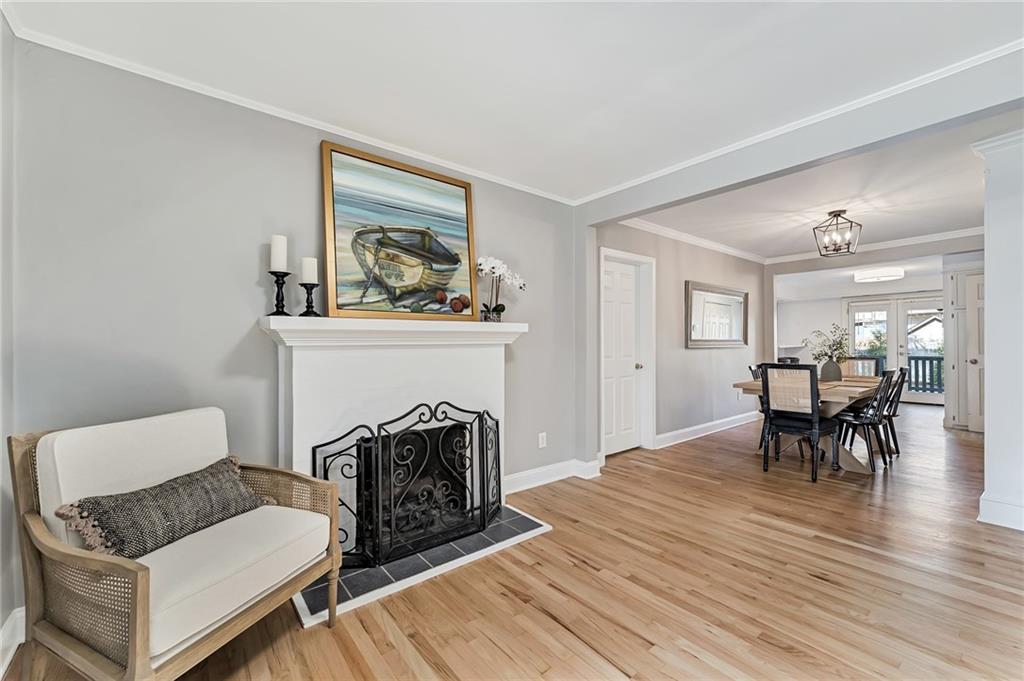 777 Forrest Street Northwest Atlanta, GA 30318 - Photo 12 of 35 a living room with furniture and a fireplace