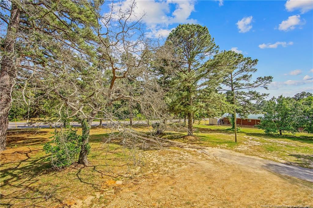 4305 Rosehill Road, Unit C Fayetteville, NC 28311 - Photo 2 of 7 a view of a lake with a building in the background