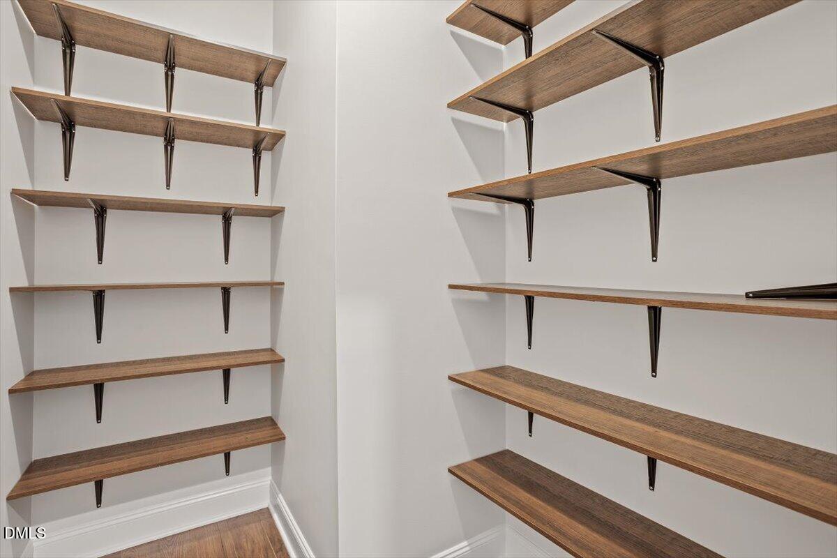 402 Ressler Street Holly Springs, NC 27540 - Photo 23 of 48 Kitchen Pantry- Upgraded Shelving