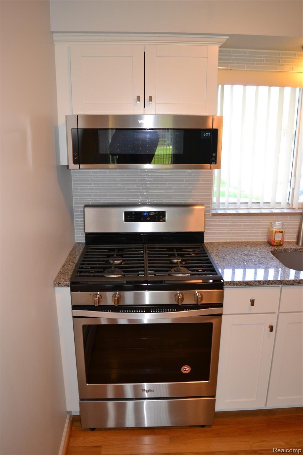 451 Miller Avenue, Unit 111 Rochester, MI 48307 - Photo 5 of 26 05 - Brand New SS Appliance.JPG