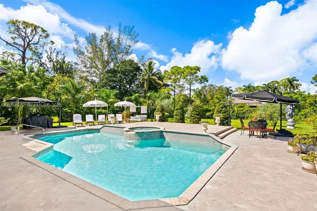 a view of a house with a swimming pool