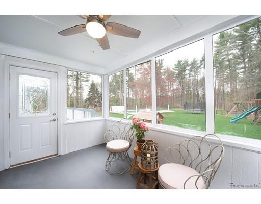17 Mill Run Road Boxford, MA 01921 - Photo 15 of 26 a living room with furniture and a large window