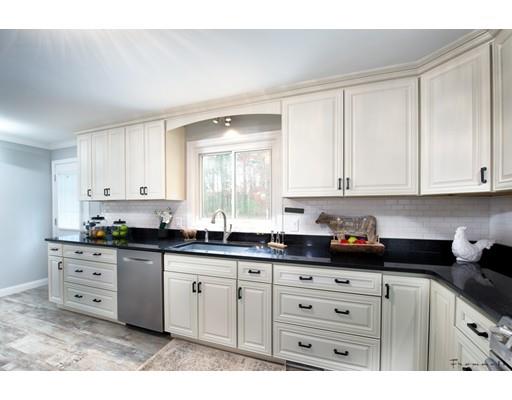 17 Mill Run Road Boxford, MA 01921 - Photo 18 of 26 a kitchen with granite countertop white cabinets and sink