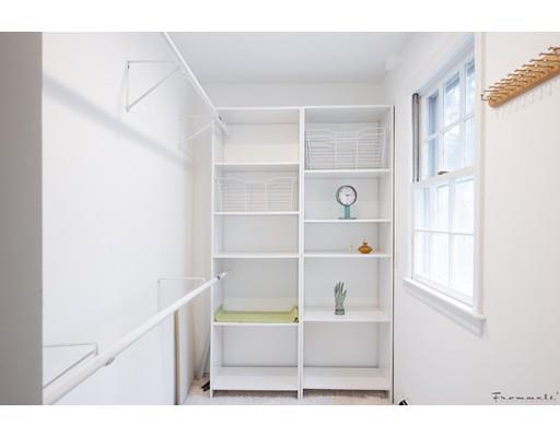 17 Mill Run Road Boxford, MA 01921 - Photo 20 of 26 a view of an empty room with cabinet and window