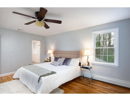 17 Mill Run Road Boxford, MA 01921 - Photo 21 of 26 a bedroom with a bed and window