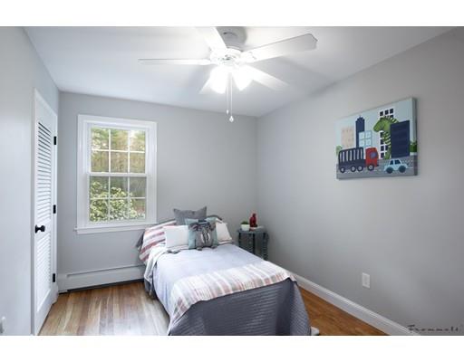 17 Mill Run Road Boxford, MA 01921 - Photo 23 of 26 a bedroom with a bed and a window