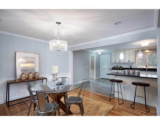 17 Mill Run Road Boxford, MA 01921 - Photo 8 of 26 a view of a dining room with furniture and chandelier