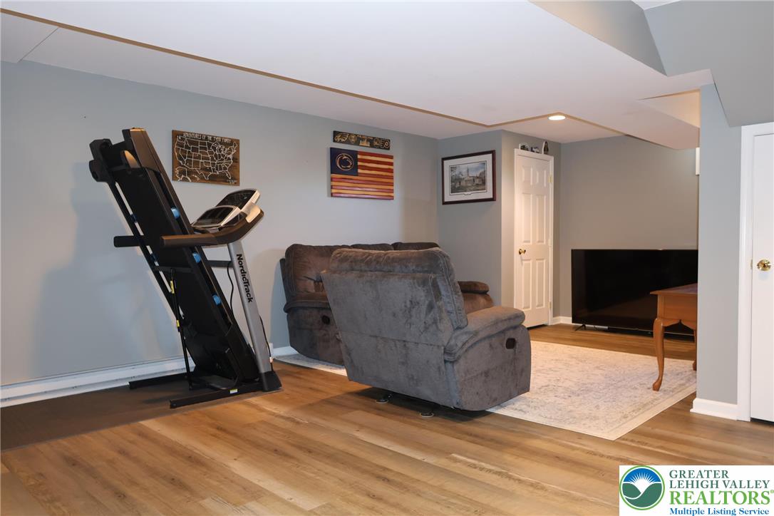 396 Anthony Drive Northampton, PA 18067 - Photo 13 of 35 a living room with furniture and a flat screen tv