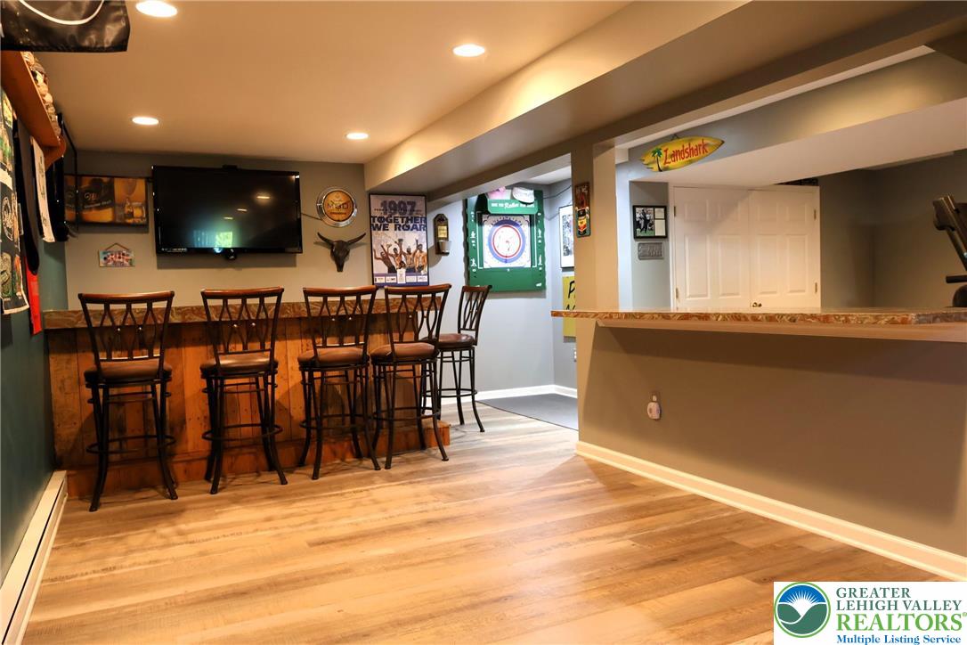 396 Anthony Drive Northampton, PA 18067 - Photo 14 of 35 a view of a dining room with furniture window and wooden floor