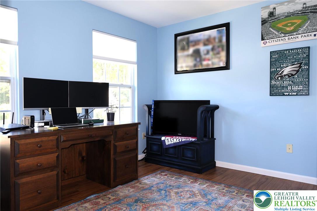 396 Anthony Drive Northampton, PA 18067 - Photo 18 of 35 a room with furniture and flat screen tv