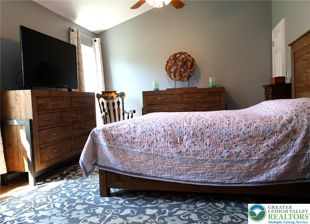 396 Anthony Drive Northampton, PA 18067 - Photo 21 of 35 a bed sitting in a bedroom and flat screen tv