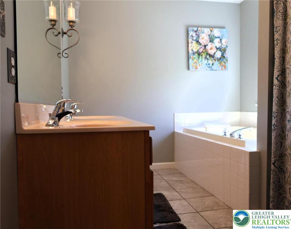 396 Anthony Drive Northampton, PA 18067 - Photo 23 of 35 a bathroom with a sink and a mirror