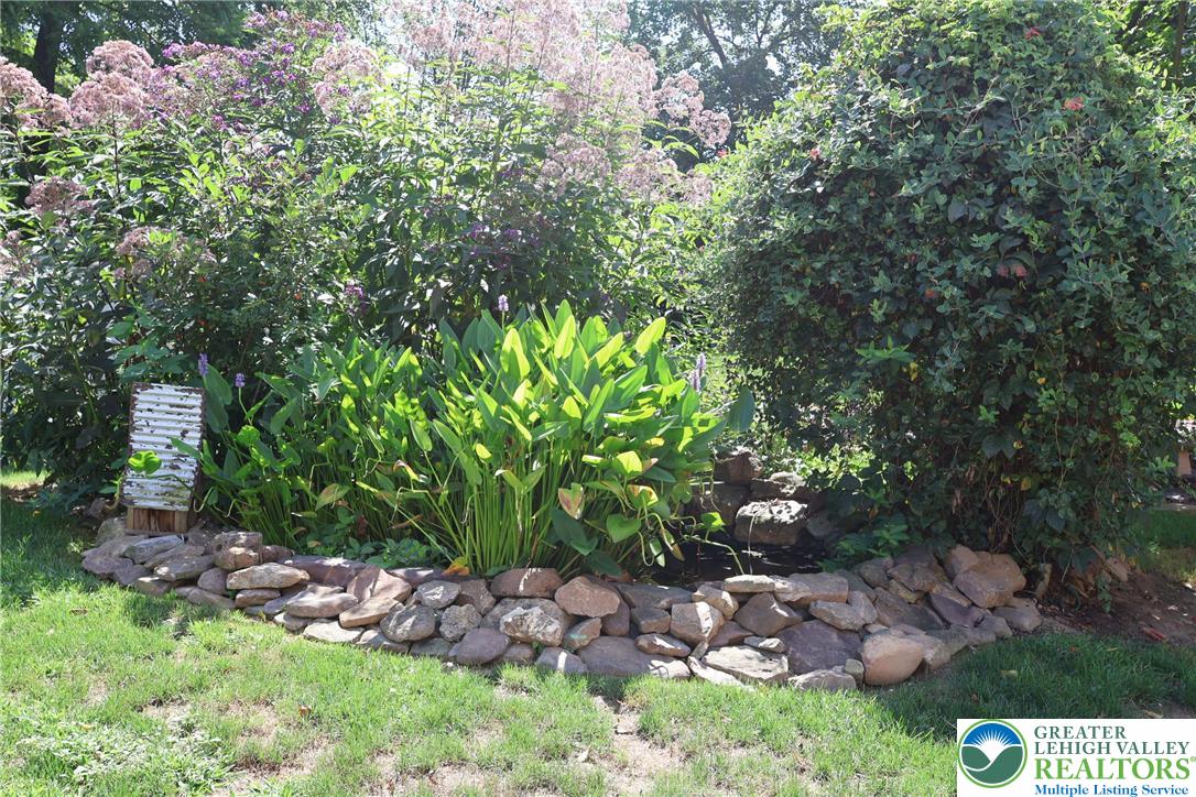 396 Anthony Drive Northampton, PA 18067 - Photo 32 of 35 a view of a garden with a tree