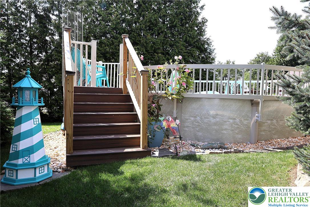 396 Anthony Drive Northampton, PA 18067 - Photo 35 of 35 a view of a house with a small yard next to a fountain