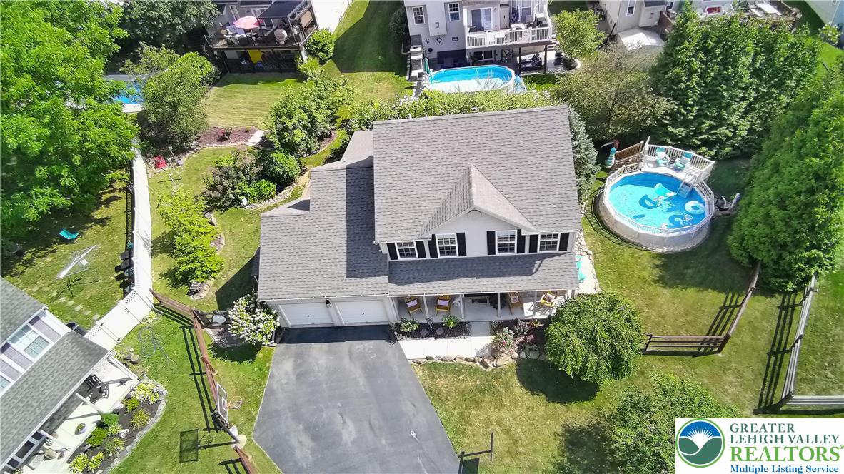 396 Anthony Drive Northampton, PA 18067 - Photo 4 of 35 an aerial view of a house with swimming pool and garden