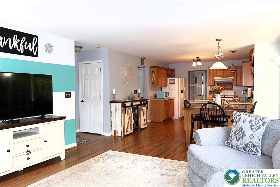 396 Anthony Drive Northampton, PA 18067 - Photo 7 of 35 a living room with furniture and a flat screen tv