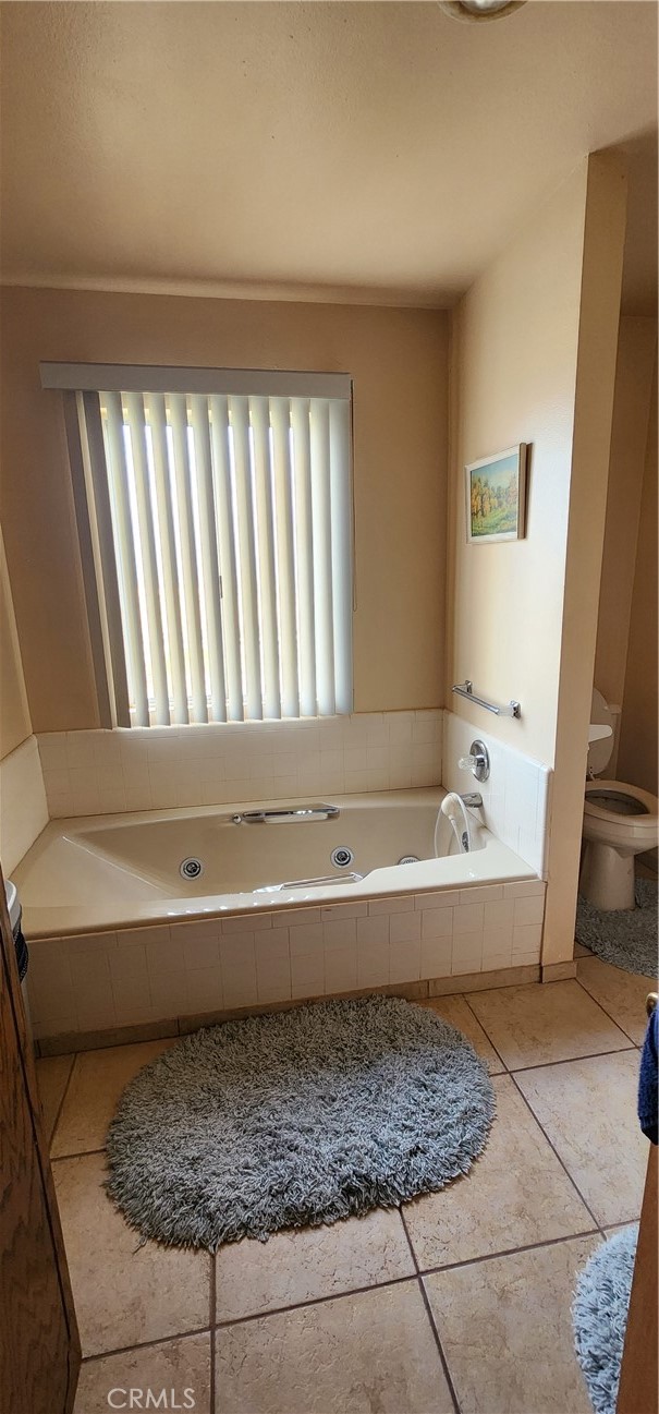 12491 Toby Lane Blythe, CA 92225 - Photo 12 of 41 a bathroom with a bathtub and shower