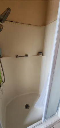 a bathroom with a sink vanity and a mirror