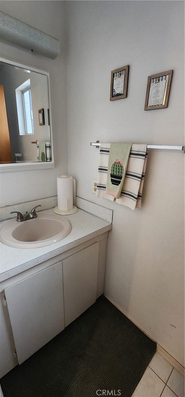 12491 Toby Lane Blythe, CA 92225 - Photo 18 of 41 a bathroom with a sink and a mirror