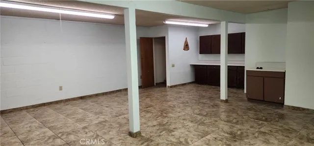 a view of a house with a small yard