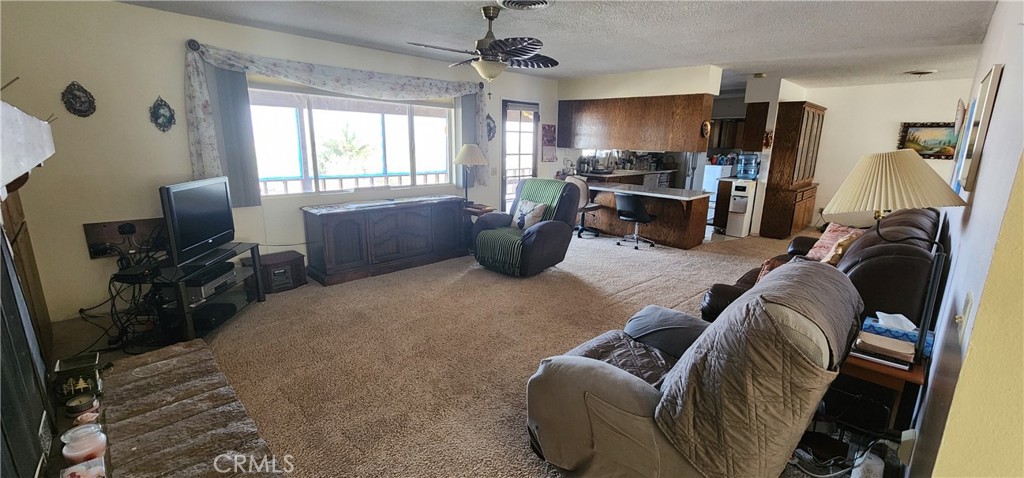 12491 Toby Lane Blythe, CA 92225 - Photo 8 of 41 a living room with furniture and a window