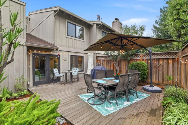 a outdoor space with furniture and umbrella