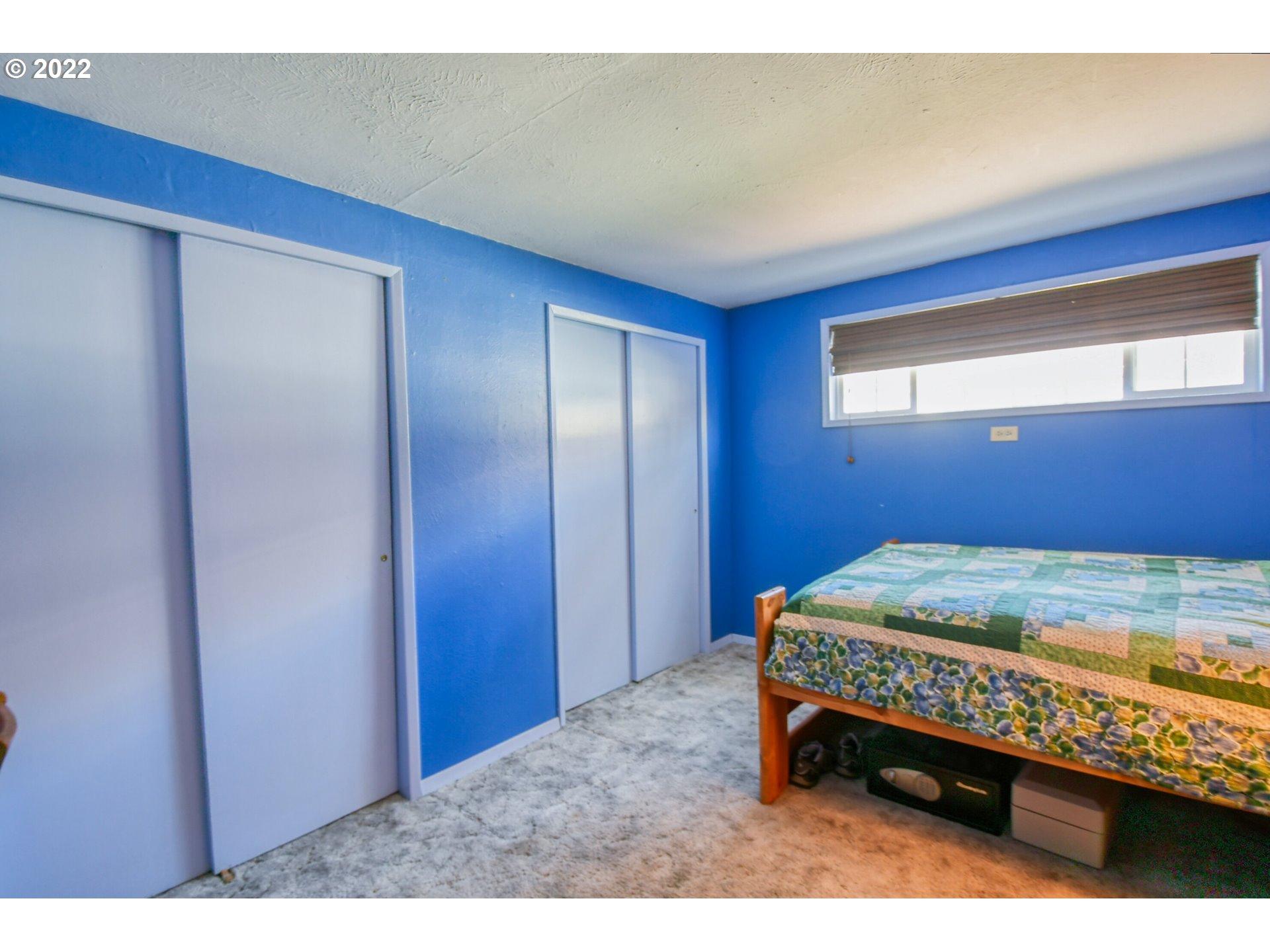 2917 Southwest Ladow Avenue Pendleton, OR 97801 - Photo 18 of 31 a bedroom with a bed and a dresser