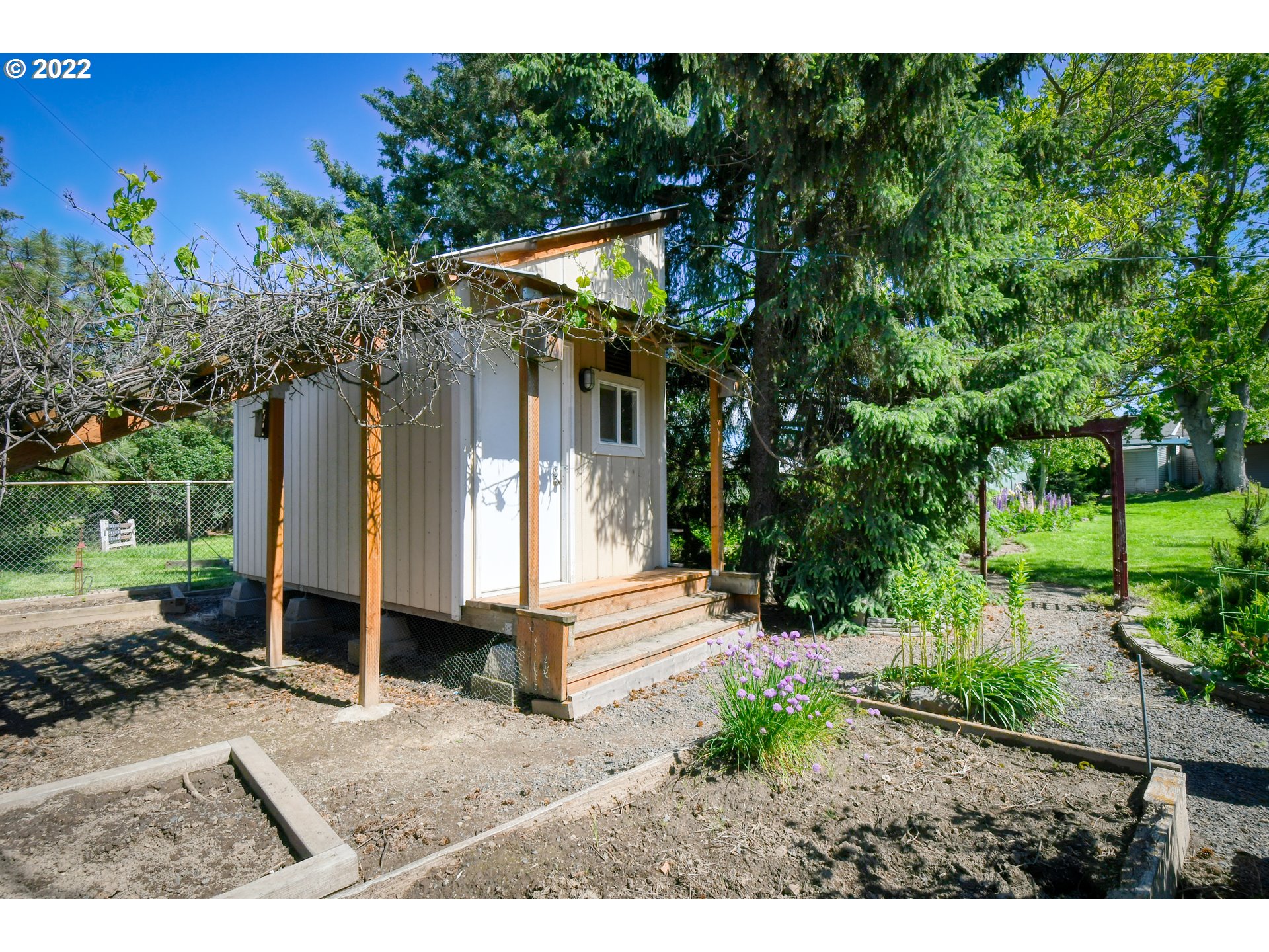 2917 Southwest Ladow Avenue Pendleton, OR 97801 - Photo 30 of 31 a view of a house with backyard and sitting area