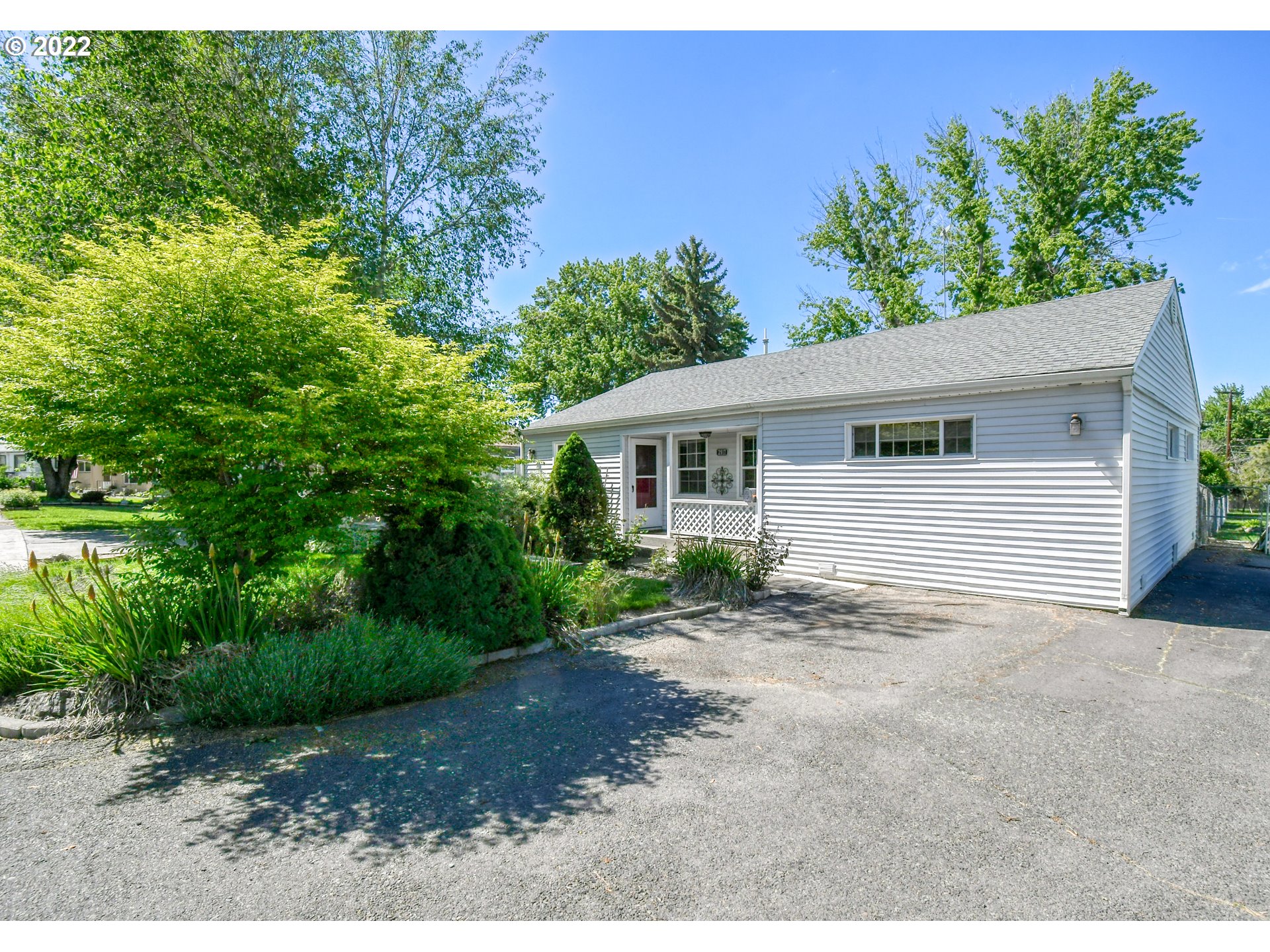 2917 Southwest Ladow Avenue Pendleton, OR 97801 - Photo 3 of 31 a view of a house with a backyard