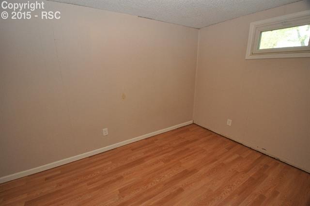 6 South Chelton Road Colorado Springs, CO 80910 - Photo 12 of 16 Bedroom 4 - basement