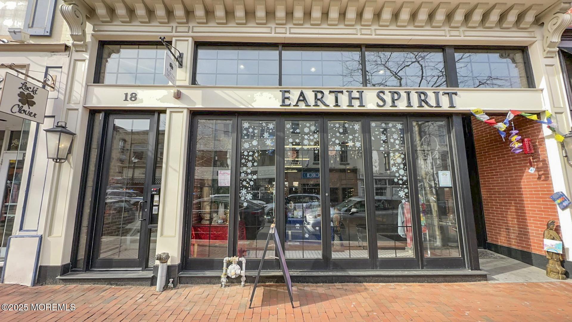 18 Broad Street, Unit 2F Red Bank, NJ 07701 - Photo 2 of 13 a black and white building with glass windows