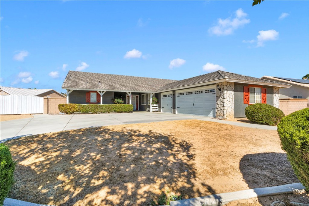 12949 Choco Road Apple Valley, CA 92308 - Photo 1 of 50 a house view with a outdoor space